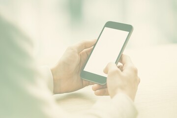 Poster - Office worker is using a smartphone with a blank screen, providing a perfect space for your app or website advertisement, in a bright and modern office setting