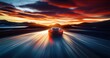 © David Giraud - Une voiture de sport roulant à grande vitesse sur une route avec un paysage montagneux en arrière-plan, coucher de soleil magnifique, ciel coloré vibrant, flou de mouvement.