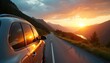 © miss irine - Car travels mountain road at sunset. Scenic landscape with winding asphalt highway. Dramatic sky and clouds. Road trip, journey, adventure, transportation, travel, freedom, scenic view, leisure.