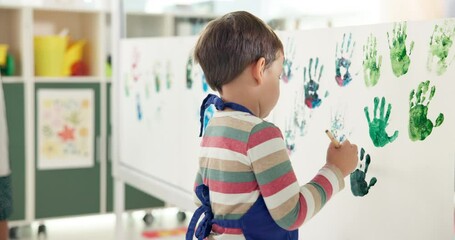 Poster - Boy, student and art for painting handprint of creative lesson, self expression and kindergarten learning. Child, identity canvas of fun activity, artwork project and motor growth of education memory