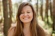 © Tina kids photo - beautiful young woman walks in the woods in the summer, meditates