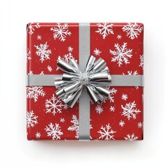 Wall Mural - Red gift with snowflakes and silver ribbon on a white background on isoleted white background