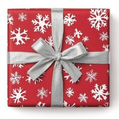 Wall Mural - A christmas gift wrapped in red paper with white snowflakes pattern on isoleted on white background