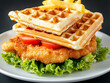 © Atlantis - Delicious crispy chicken and waffles with french fries, tomato and lettuce