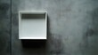 © STDG - White Square Frame Mockup on Gray Wall for Minimalist Design