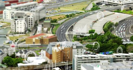 Poster - Tilt-shift effect on urban landscape with digital data processing animation overlay