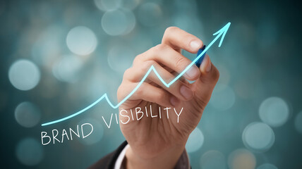 Poster - Hand drawing upward brand visibility graph, symbolizing growth and success in business marketing strategy