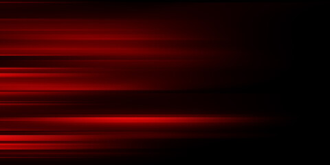 Fototapete - The effect of red light in fast motion on a black background. blurred abstract background with long exposure. neon light
