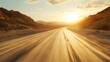 © EUT - Blurred road goes through desert mountains at sunset with bright sun. It shows journey, freedom, adventure, progress, or travel concepts.