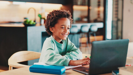 Poster - Homework, laptop and child in home for online learning, education and virtual lesson on school website. Happy, growth and young boy on computer for assessment, knowledge and studying on webinar