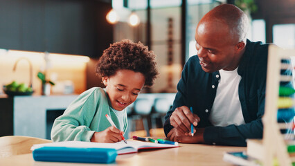 Poster - Black family, father and kid with homework in home for homeschool activity, writing development and help. Happy people, man or boy student with book for creative lesson, learning support or education