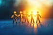 © YouraPechkin - Group of paper cut-out figures holding hands, symbolizing unity during sunset outdoors