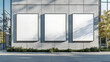 © IA Tuga - Modern Concrete Wall with Three Blank Posters and Soft Shadows in Urban Setting for Advertisement Mockup Design