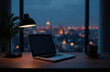 © Alena - Home office room with laptop computer and copy space on working desk over blurred outdoor view at night