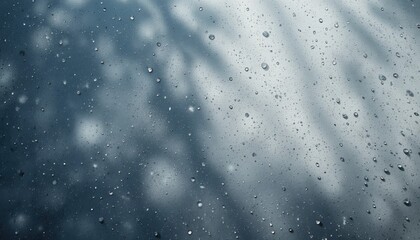 Poster - Raindrops creating abstract patterns on window glass urban environment high-resolution photography atmospheric mood close-up perspective nature meets urban life