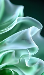 Poster - Soft flowing mint green and white silk fabric creates elegant waves and folds against dark background, showcasing luxurious textile movement and gentle curves.