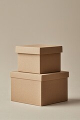 Poster - Two minimalist brown boxes stacked neatly against a neutral background, showcasing a simple yet elegant design.