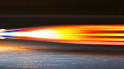 Poster - A long vibrant colored streak of energetic light in darkness