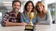 © Narongdet - Celebration achievement family gathering trophy in modern workspace personal moment bright atmosphere