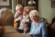 © Davor - Happy senior friends having coffee and conversation at home