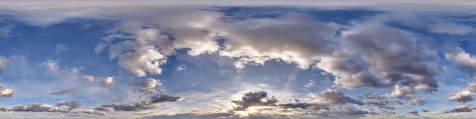 Wall Mural - blue sky hdri 360 panorama with clouds before sunset with zenith for use in 3d graphics as sky dome 