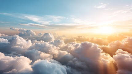 Fototapete - Fluffy white clouds flow gracefully over the calm ocean waters as sunlight filters through, casting a warm glow in the early morning sky