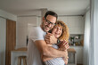 © Miljan Živković - Happy adult caucasian couple at home husband and wife family concept