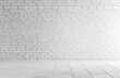 © Adri - Blank white brick wall and floor.  Empty studio space