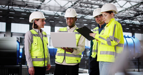 Leinwandbilder - Skilled African Engineer Inspecting Industrial Facility