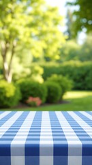Poster - Blue checkered tablecloth texture top view with abstract green, garden in blurred morning background. Empty checkered table for display montages