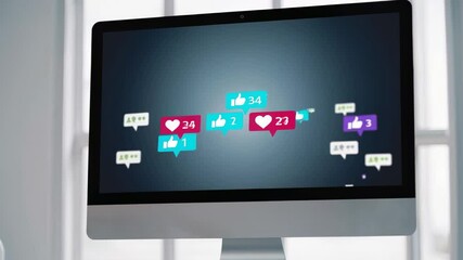 Poster - Colorful like and heart icons float across a desktop computer screen, representing growing social media engagement and positive feedback on content