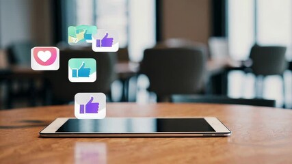 Poster - Colorful like and heart icons are increasing above a digital tablet lying on a table in an office meeting room, symbolizing growing online engagement and social media success