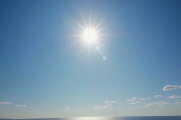clear sky, bright sun, ocean horizon