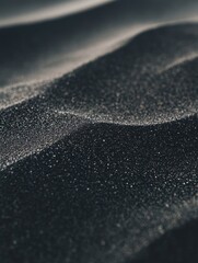 Poster - Abstract dark sand dunes texture with dramatic lighting creating a serene and minimalist landscape photography