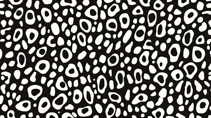 Monochrome organic cell pattern featuring irregular shapes and fluid design