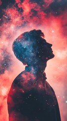Wall Mural - Silhouette of a man with nebula background.