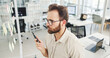 © DavidL2000/peopleimages.com - Business, glass wall and man with creativity, decision and planning with ideas for proposal. Person, sticky notes o sales consultant with contemplation, problem solving and brainstorming for project