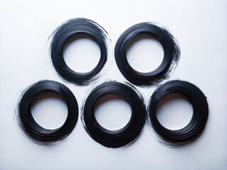 Poster - Abstract Black Brush Stroke Circles on White Background - Aerial Drone View