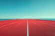 © A.Ex - Red running track by the ocean, vibrant contrast of blue and red.