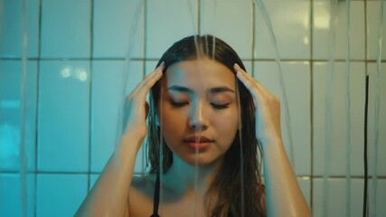Poster - A woman stands in the shower with her eyes closed, enjoying the warm water.