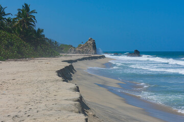 beautiful wild beach in the natural park on the northern coast of colombia.