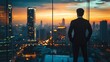 © Mitchell - Business man looking at city skyline at sunset corporate success leadership vision future opportunity plan 100