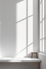 Poster - Sunlight Filters Through Large Windows Creating Soft Shadows in a Minimalist Interior Space With a Simple Wooden Stool