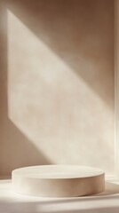 Poster - Warm Sunlight Filters Through Soft Curtains Onto a Minimalist Design Space With a Round Stone Surface and Draped Fabric in a Neutral Palette