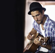 © peopleimages.com - Guitar, jazz or man in home for music, performance or entertainment with sound, rhythm or talent. Learning solo, male artist or creative musician playing an instrument for artistic expression alone