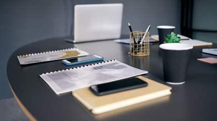 Poster - Empty office, table or portfolio in agency interior or desk with pens, file and stationery for business or plan. Project, background and modern workspace with laptop, notebook and coffee beverage