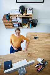 Leinwandbilder - Above, office and creative woman in startup with project as web developer, coding and typing online. Happy, company and person on coffee break and programming website, app or desktop for productivity