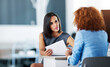 © peopleimages.com - Meeting, woman and interview for job at desk, office and conversation for recruitment. Application, manager and female person in human resources for hire, employee and law firm for attorney vacancy