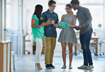 Poster - Coworkers, talking and strategy in office together, file and report or company project or diversity teamwork. Business meeting, conversation and brainstorming or standing, workplace and collaboration