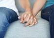 © Anne/peopleimages.com - Couple, love and holding hands for trust, care and solidarity or romance in home. Compassion, partnership and support with affection for people in relationship, marriage and therapy for mental health